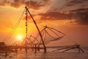 Fort Kochi Chinese fishing nets sunset — free attraction Kerala budget trip 2026