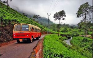 Kerala KSRTC bus mountain road Munnar — cheapest way to travel budget trip 2026