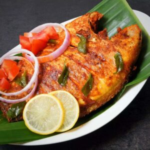 Karimeen Pollichathu Kerala banana leaf — Pearl Spot fish traditional recipe 2026