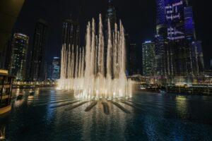 Dubai Fountain free show at night from public boardwalk — save money tip 2026