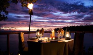 Honeymoon dinner table by water