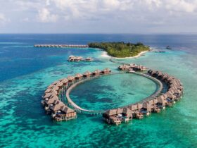 maldives overwater villa aerial luxury