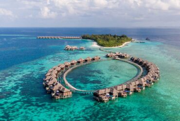 maldives overwater villa aerial luxury