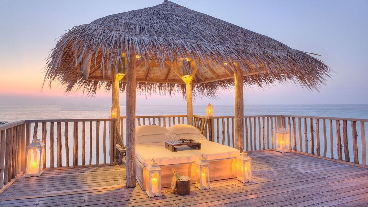 maldives overwater villa couple view