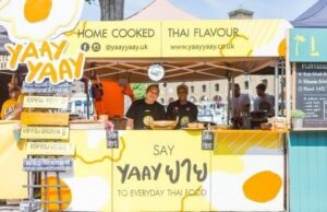 Jay food stall yellow sign